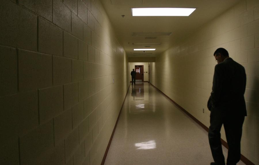 A corridor that leads to a guarded door is seen at the Port Isabel detention facility in Texas on Dec. 17, 2008. (Credit Jose Cabezas / AFP / Getty Images)