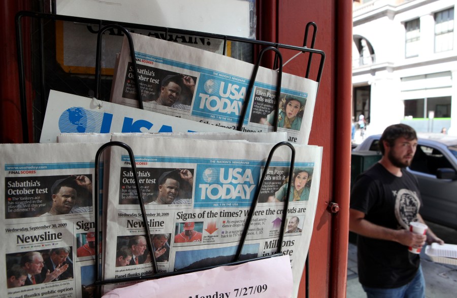 Copies of USA Today are displayed on a rack on Sept. 30, 2009 in San Francisco. (Credit: Justin Sullivan/Getty Images)