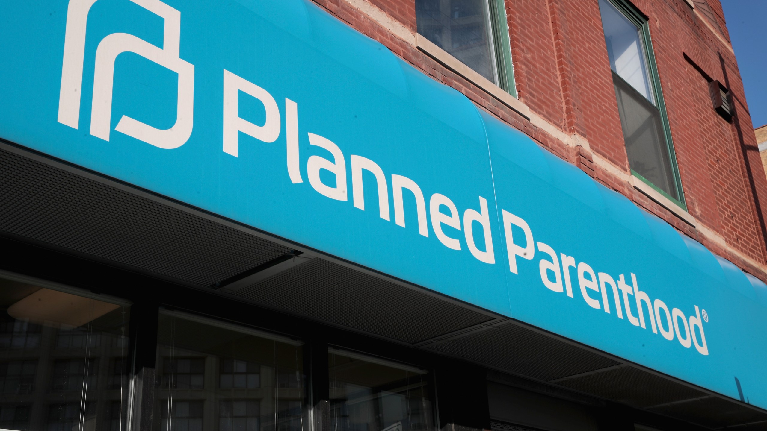 A sign hangs above a Planned Parenthood clinic on May 18, 2018, in Chicago. (Scott Olson/Getty Images)