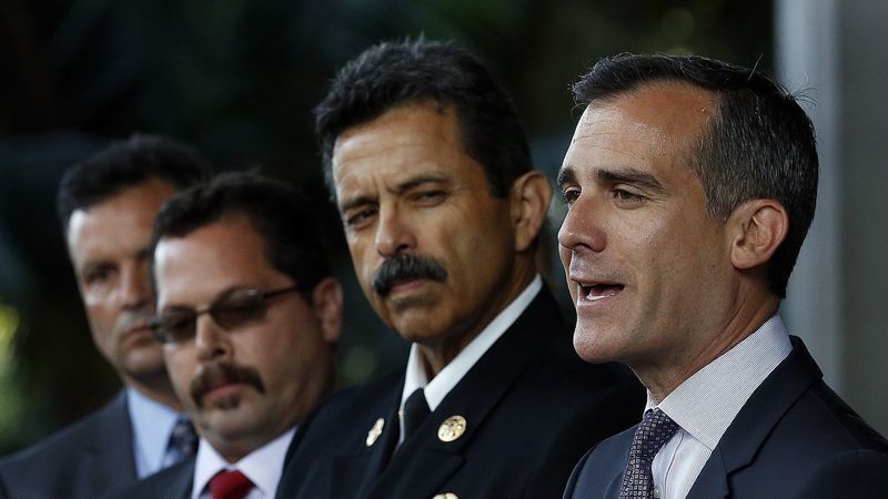 Los Angeles Mayor Eric Garcetti stands next to city Fire Chief Ralph Terraza in an undated photo. (Credit: Mel Melcon / Los Angeles Times)