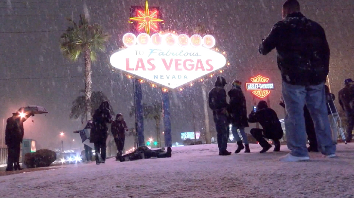 Tourists enjoy snow on the Las Vegas strip on Feb. 20, 2019. (Credit: KSNV via CNN Wire)