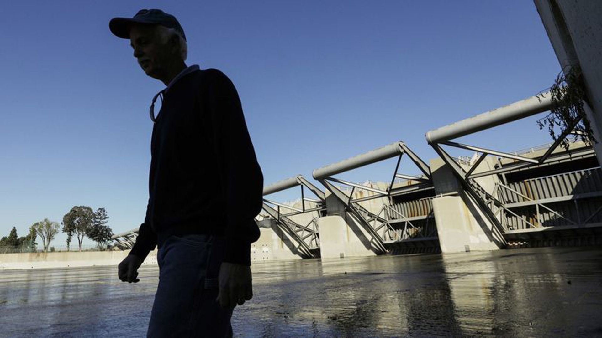 Lead engineer Douglas Chitwood at the Whittier Narrows Dam. The U.S. Army Corps of Engineers says the aging structure could fail in heavy rains. (Credit: Irfan Khan / Los Angeles Times)