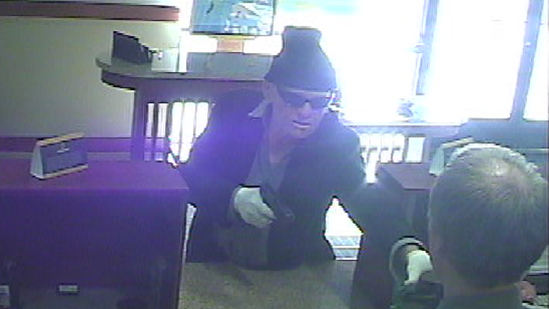 Newport Beach police are seeking the man pictured in this surveillance photo in connection with a bank robbery at OneWest Bank, 3700 East Coast Highway in Corona Del Mar, on March 7, 2019. (Credit: Newport Beach Police Department)