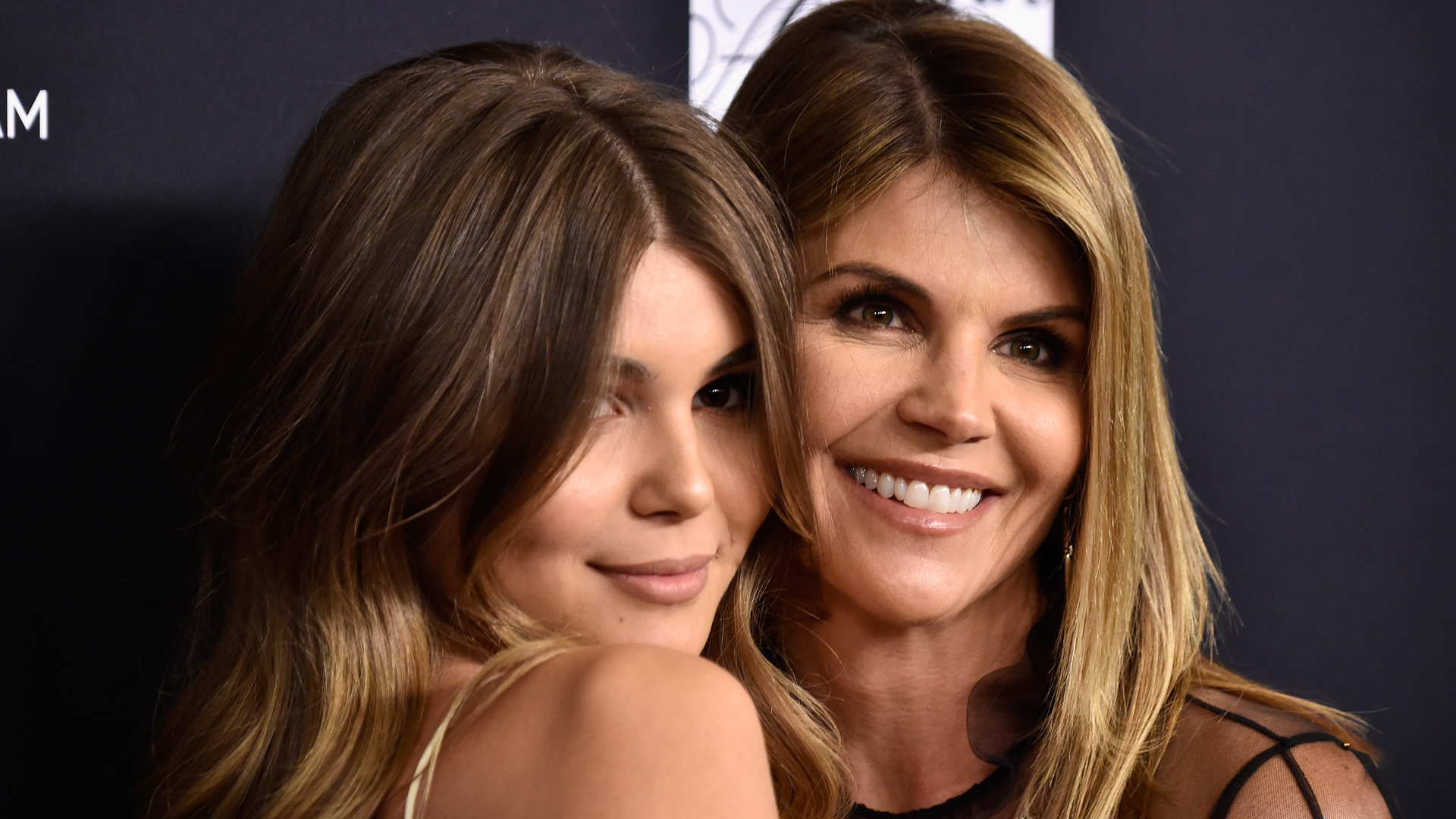 Lori Loughlin is seen with her daughter Olivia Jade Giannulli, who attends USC. (Credit: Frazer Harrison/Getty Images)