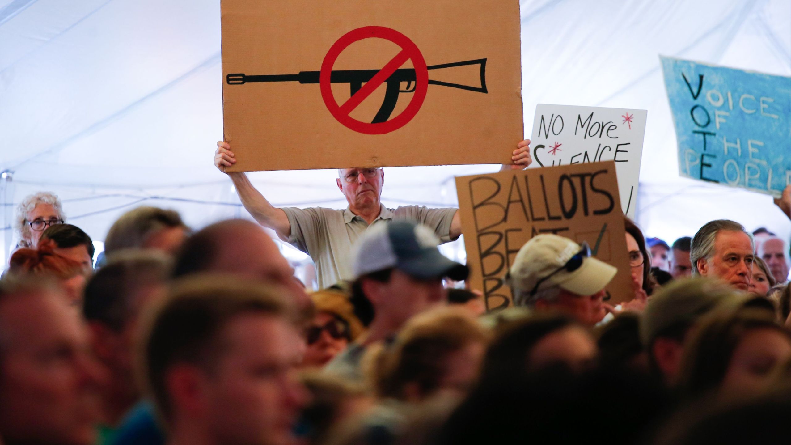 A man displays an anti gun violence sign during a March for our Lives Rally at Fairfield Hills Campus, in Newtown Connecticut on August 12, 2018. (Credit: KENA BETANCUR/AFP/Getty Images)