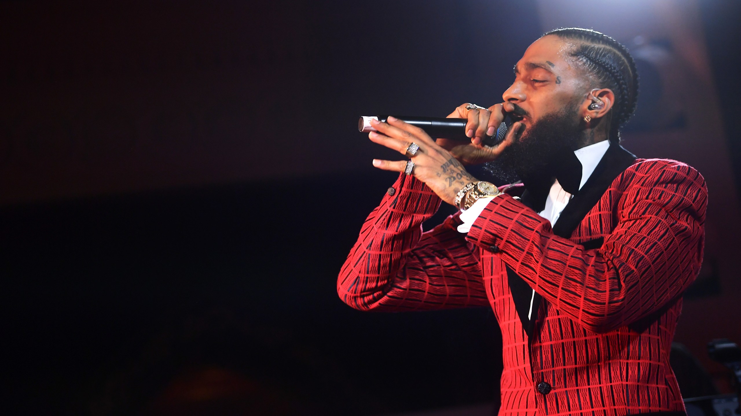 Nipsey Hussle performs onstage at the Warner Music Pre-Grammy Party at the NoMad Hotel on Feb. 7, 2019, in Los Angeles. (Credit: Matt Winkelmeyer/Getty Images for Warner Music)