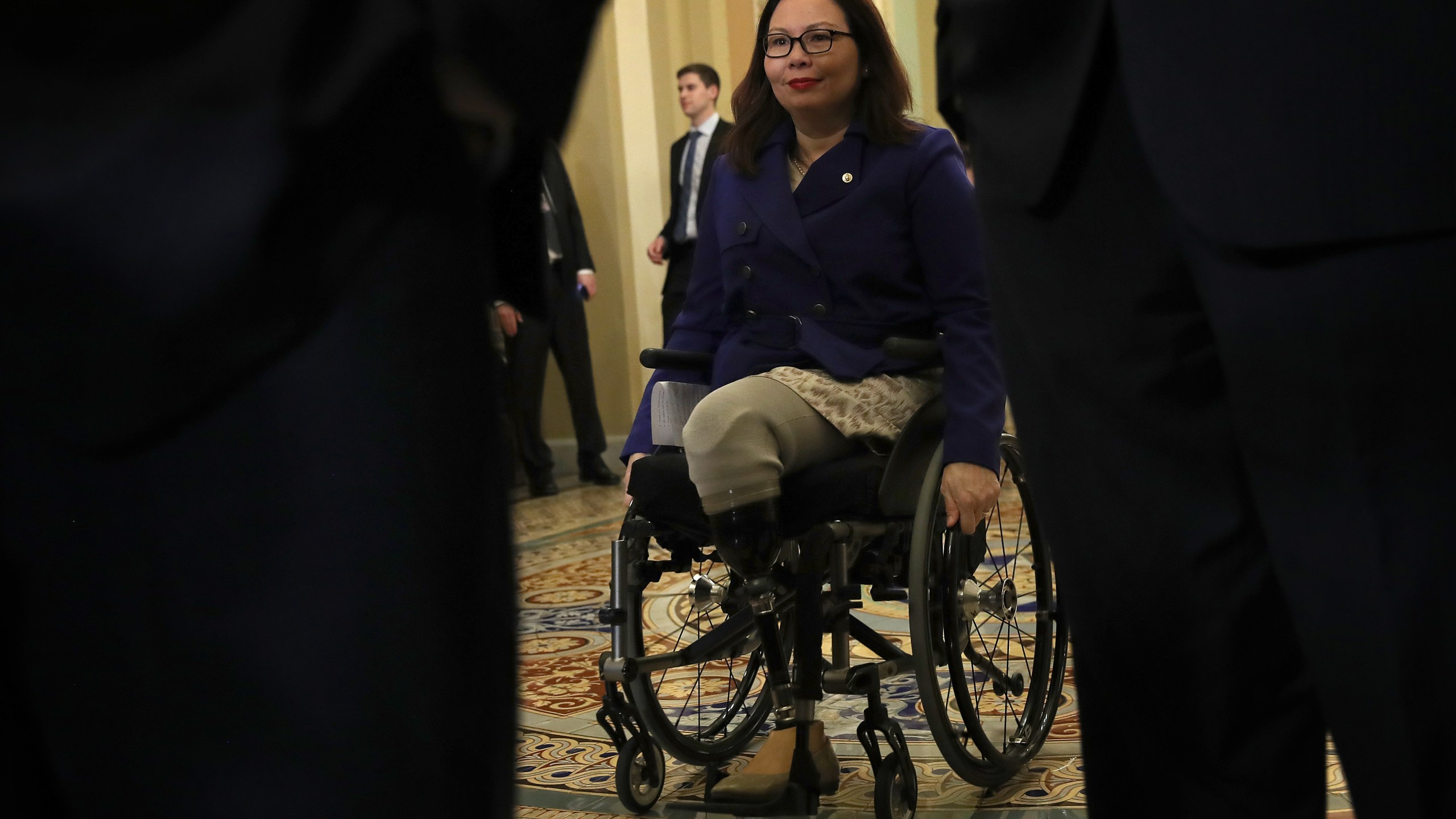 Sen. Tammy Duckworth arrives for a press conference with Democratic leaders following the Democratic policy luncheon in Washington, DC, on Jan. 29, 2019. (Credit: Win McNamee / Getty Images)