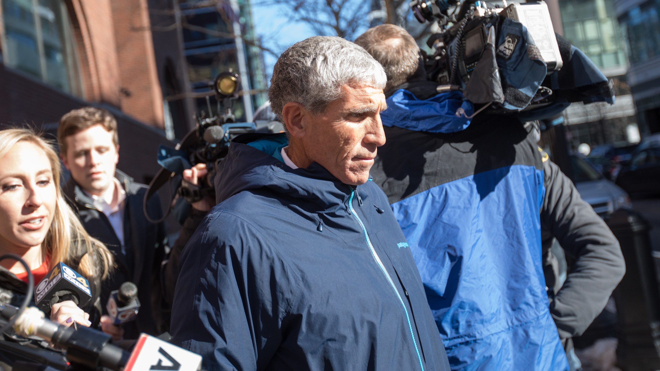 William "Rick" Singer leaves Boston Federal Court after being charged with racketeering conspiracy, money laundering conspiracy, conspiracy to defraud the United States, and obstruction of justice on March 12, 2019, in Boston, Mass. (Credit: Scott Eisen/Getty Images)