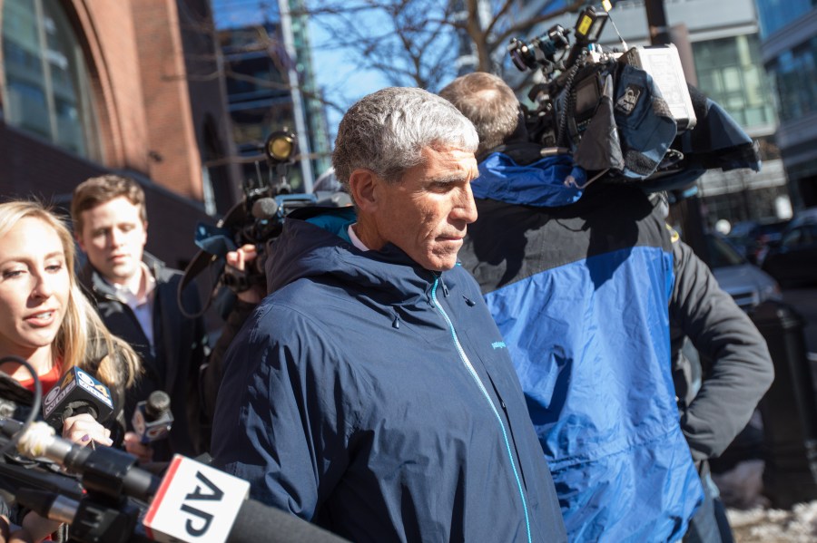 William "Rick" Singer leaves Boston Federal Court after being charged with racketeering conspiracy, money laundering conspiracy, conspiracy to defraud the United States, and obstruction of justice on March 12, 2019, in Boston, Mass. (Credit: Scott Eisen/Getty Images)