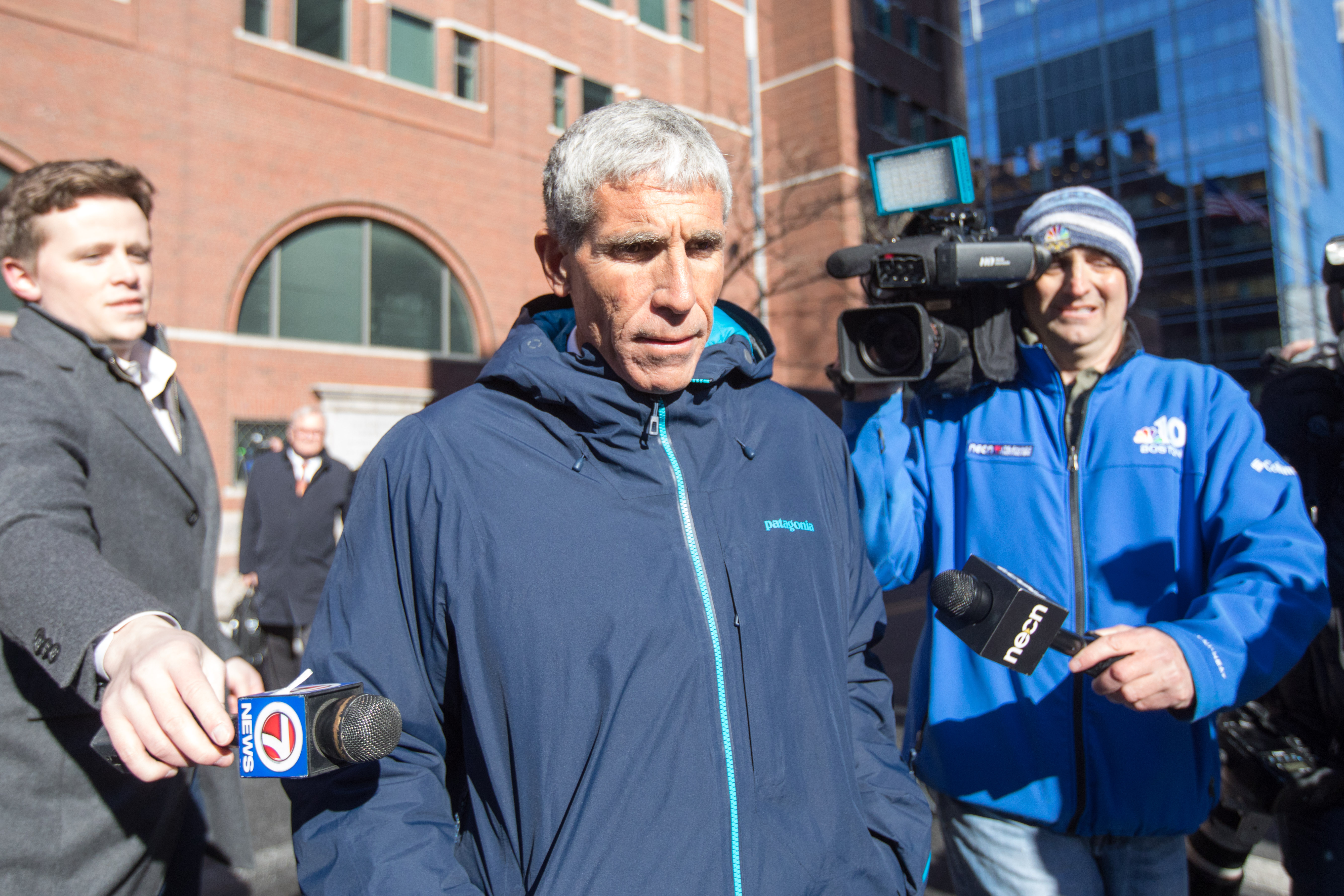 William "Rick" Singer leaves Boston Federal Court after being charged with racketeering conspiracy, money laundering conspiracy, conspiracy to defraud the United States and obstruction of justice on March 12, 2019. (Scott Eisen / Getty Images)