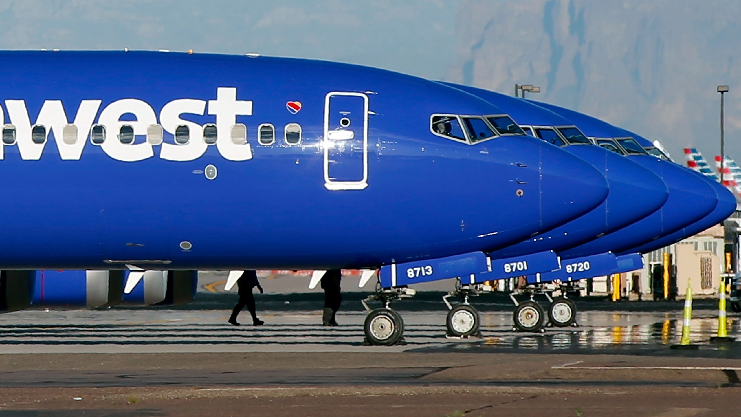 A group of Southwest Airlines Boeing 737 MAX aircraft sit on the tarmac at Phoenix Sky Harbor International Airport on March 13, 2019. (Credit: Ralph Freso / Getty Images)