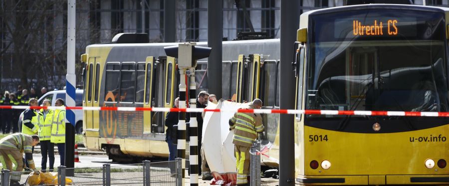 Police forces and emergency services stand at the 24 Oktoberplace in Utrecht, on March 18, 2019 where a shooting took place. (Credit: ROBIN VAN LONKHUIJSEN/AFP/Getty Images)