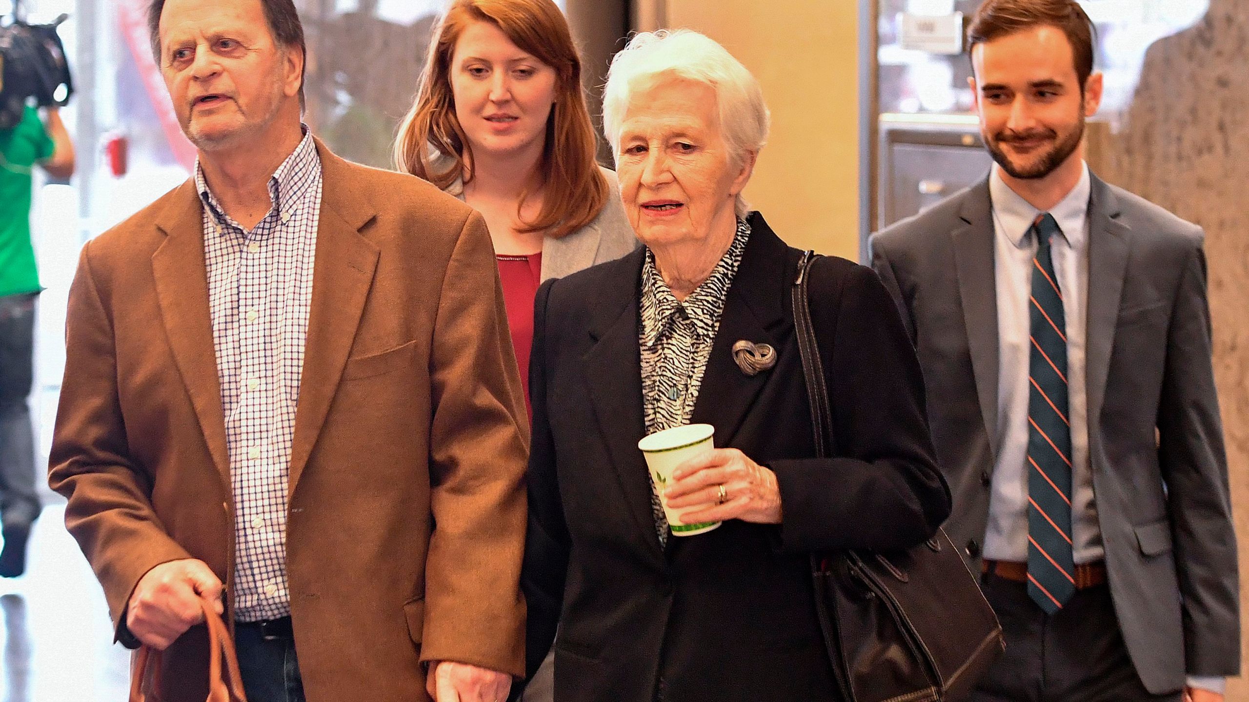 Edwin Hardeman, left, departs with his wife Mary Hardeman, second from right, after winning his case against Monsanto in San Francisco on March 27, 2019. (Credit: Josh Edelson / AFP / Getty Images)