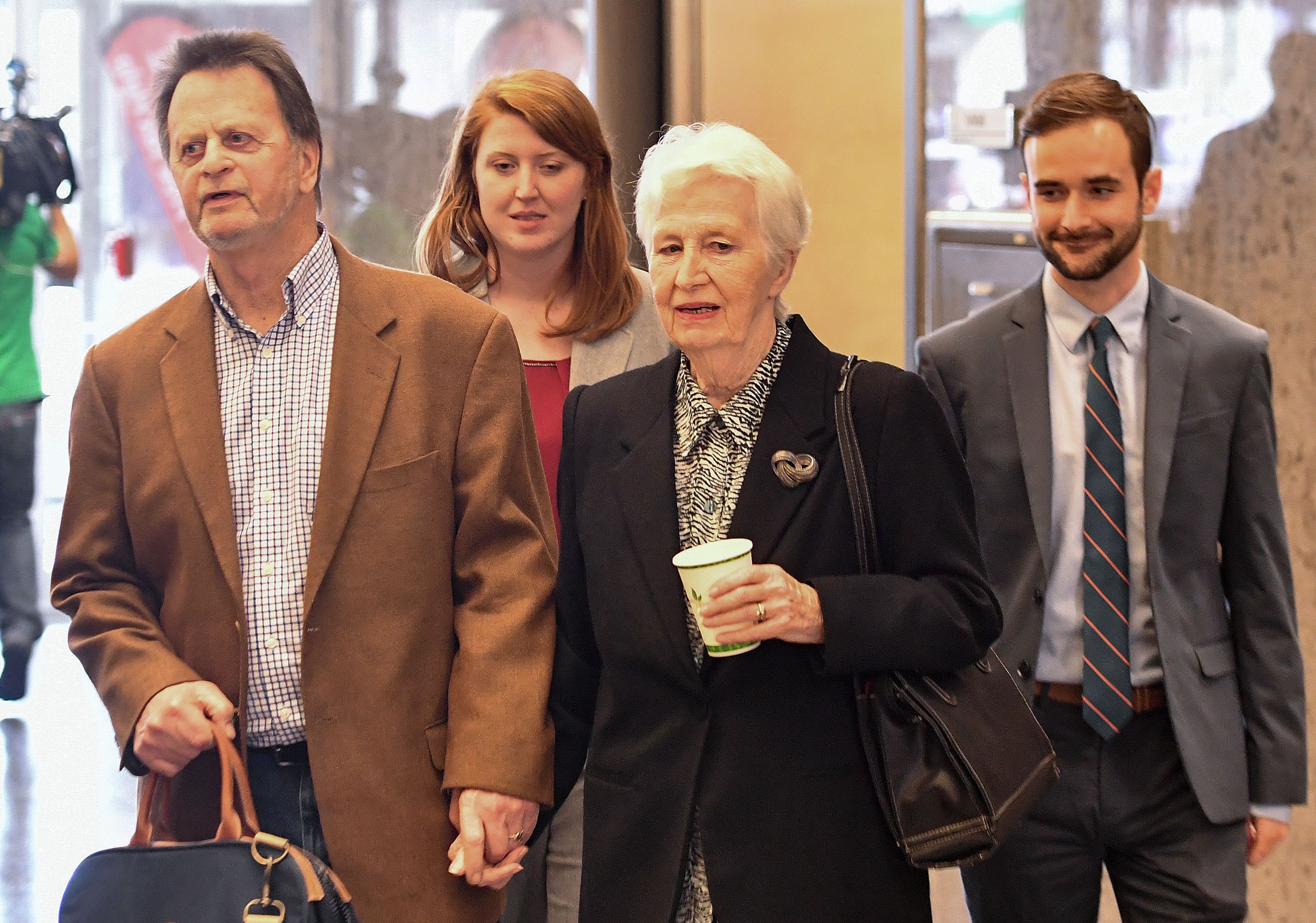 Edwin Hardeman, left, departs with his wife Mary Hardeman, second from right, after winning his case against Monsanto in San Francisco on March 27, 2019. (Credit: Josh Edelson / AFP / Getty Images)