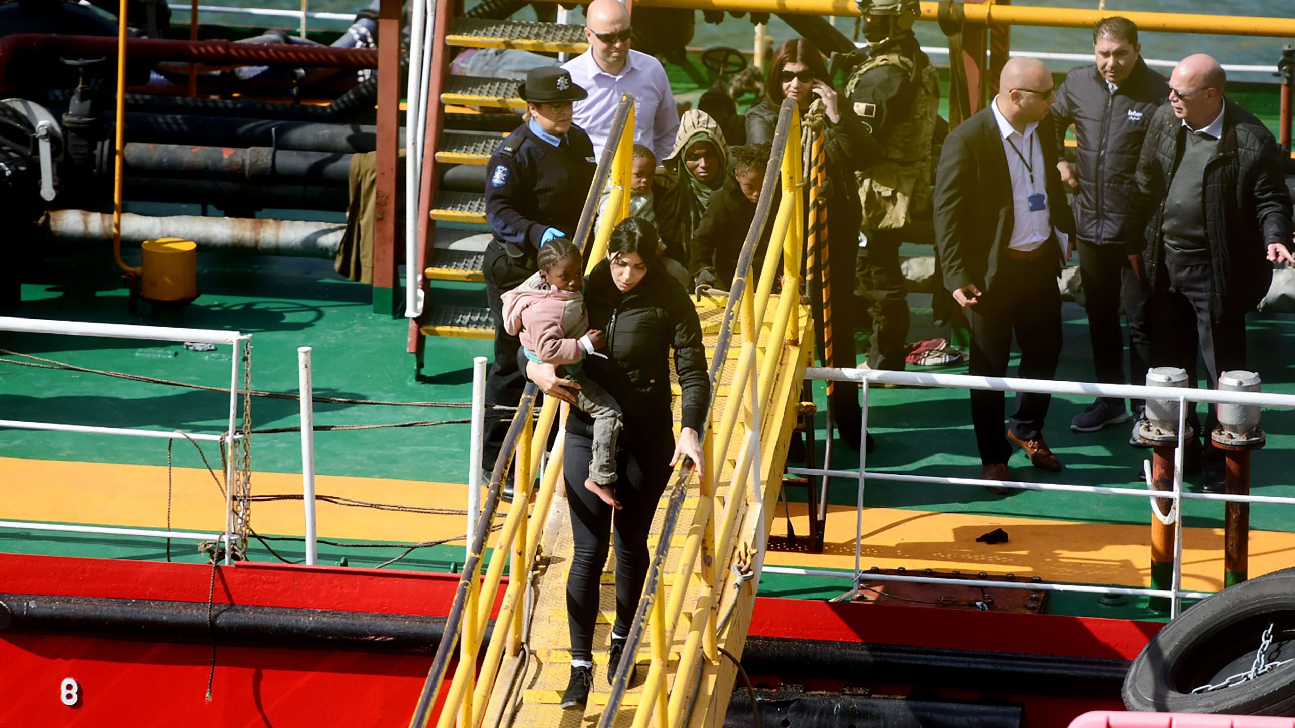 Migrants disembark from the Motor Tanker El Hiblu 1 that was hijacked by migrants in Valletta's Grand Harbour on March 28, 2019, after Maltese armed forces took control of the vessel. (Credit: JONATHAN BORG/AFP/Getty Images)