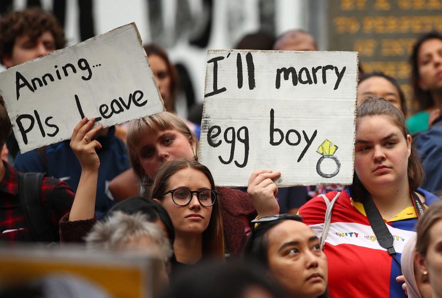 Protesters hold placards aloft as they march during the Stand Against Racism and Islamophobia: Fraser Anning Resign! rally on March 19, 2019, in Melbourne, Australia. The protesters are calling for the resignation of Sen. Fraser Anning, following the statement he issued within hours of the Christchurch terror attacks, linking the shootings at two mosques to immigration. (Credit: Scott Barbour/Getty Images)