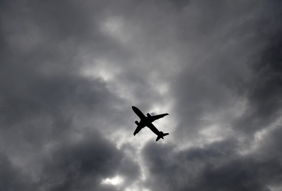 An Airbus A320 airplane is seen over Arlington, Virginia, on Sep. 23, 2013. (Credit: Saul Loeb/AFP/Getty Images)