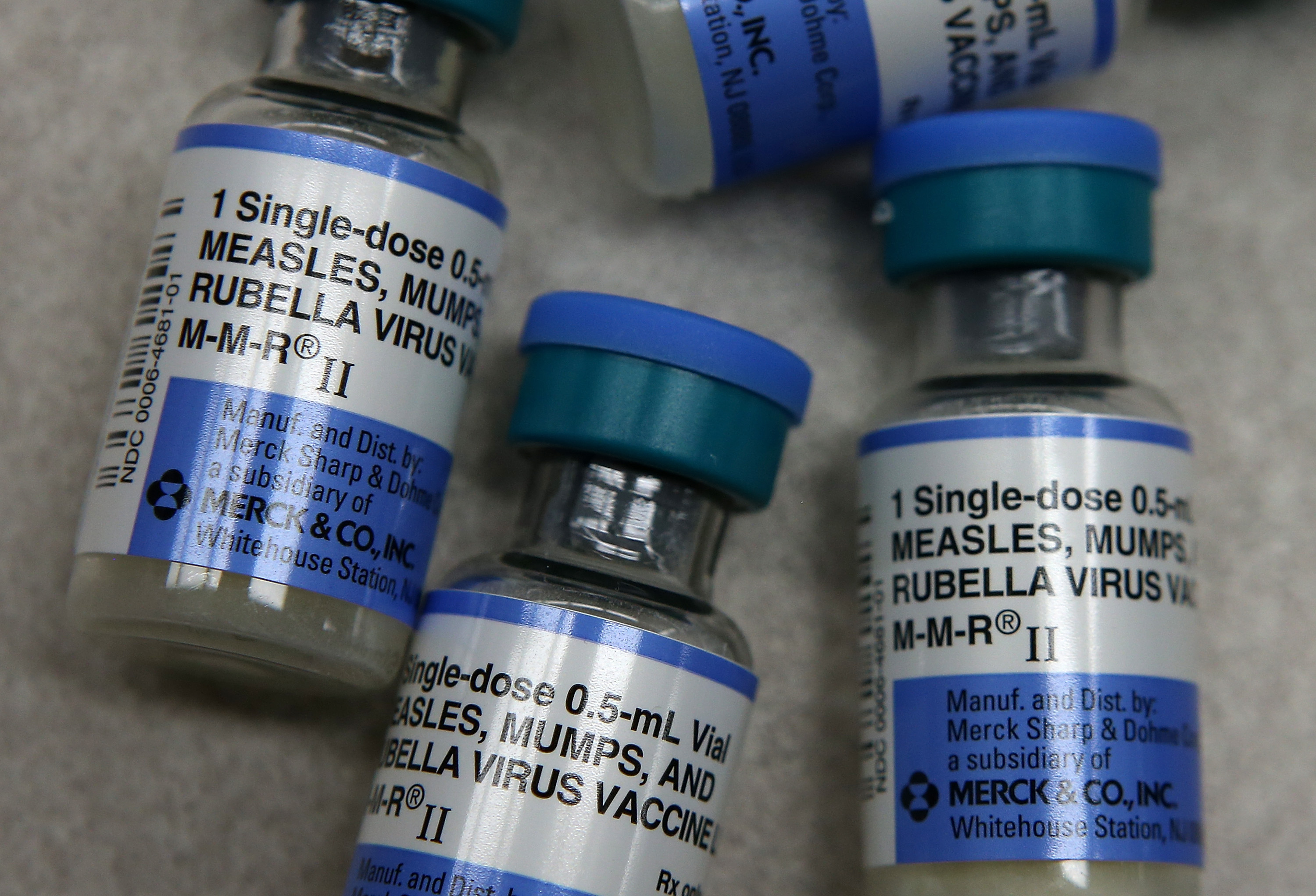 In this photo illustration, vials of measles, mumps and rubella vaccine are displayed on a counter at a Walgreens Pharmacy in Mill Valley on Jan. 26, 2015. (Credit: Justin Sullivan / Getty Images)