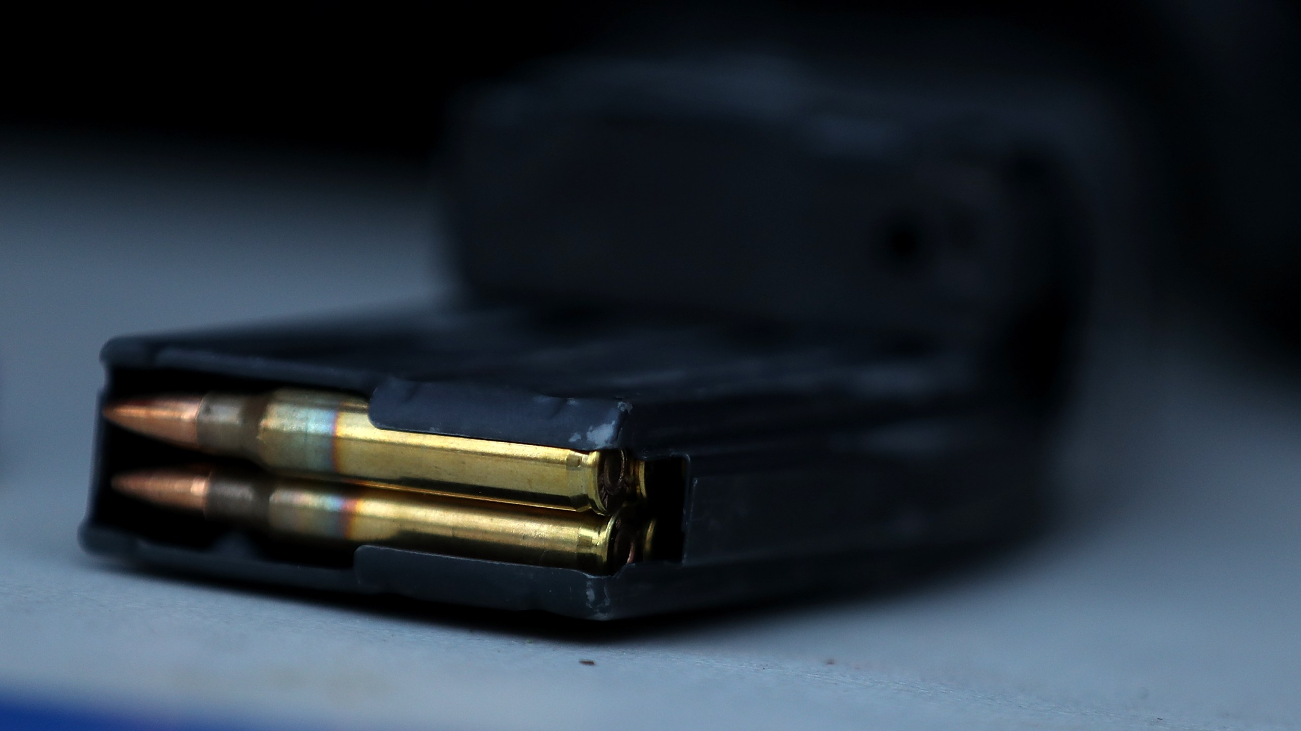 A surrendered assault rifle magazine with bullets sits on a table during a gun buyback event on December 17, 2016 in San Francisco, California. (Credit: Justin Sullivan/Getty Images)