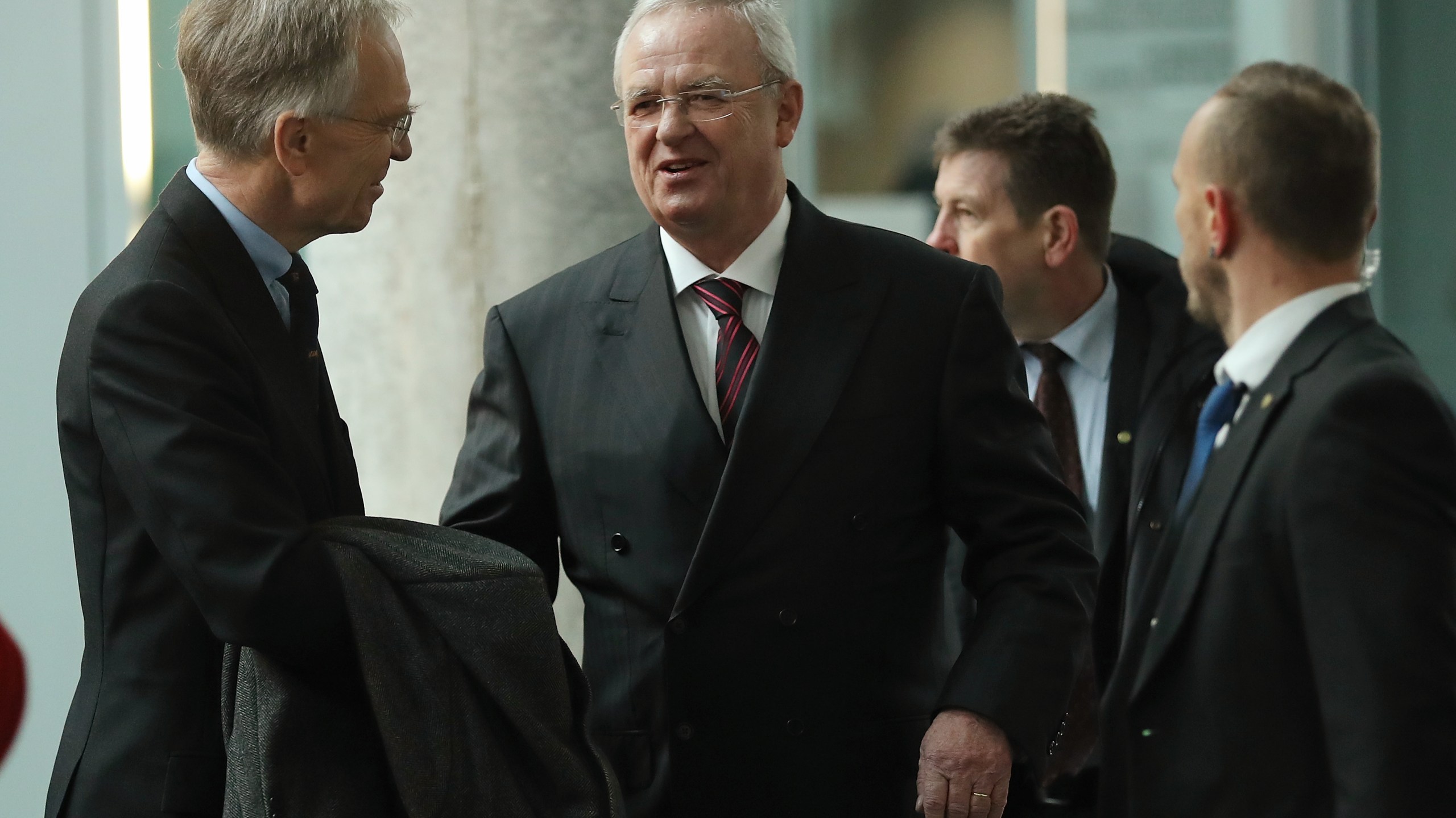 Martin Winterkorn (C), former CEO of German automaker Volkswagen AG, accompanied by his lawyer Kersten von Schenck (L), arrives to testify at the Bundestag commission investigating the Volkswagen diesel emissions scandal on January 19, 2017 in Berlin, Germany. (Credit: Sean Gallup/Getty Images)