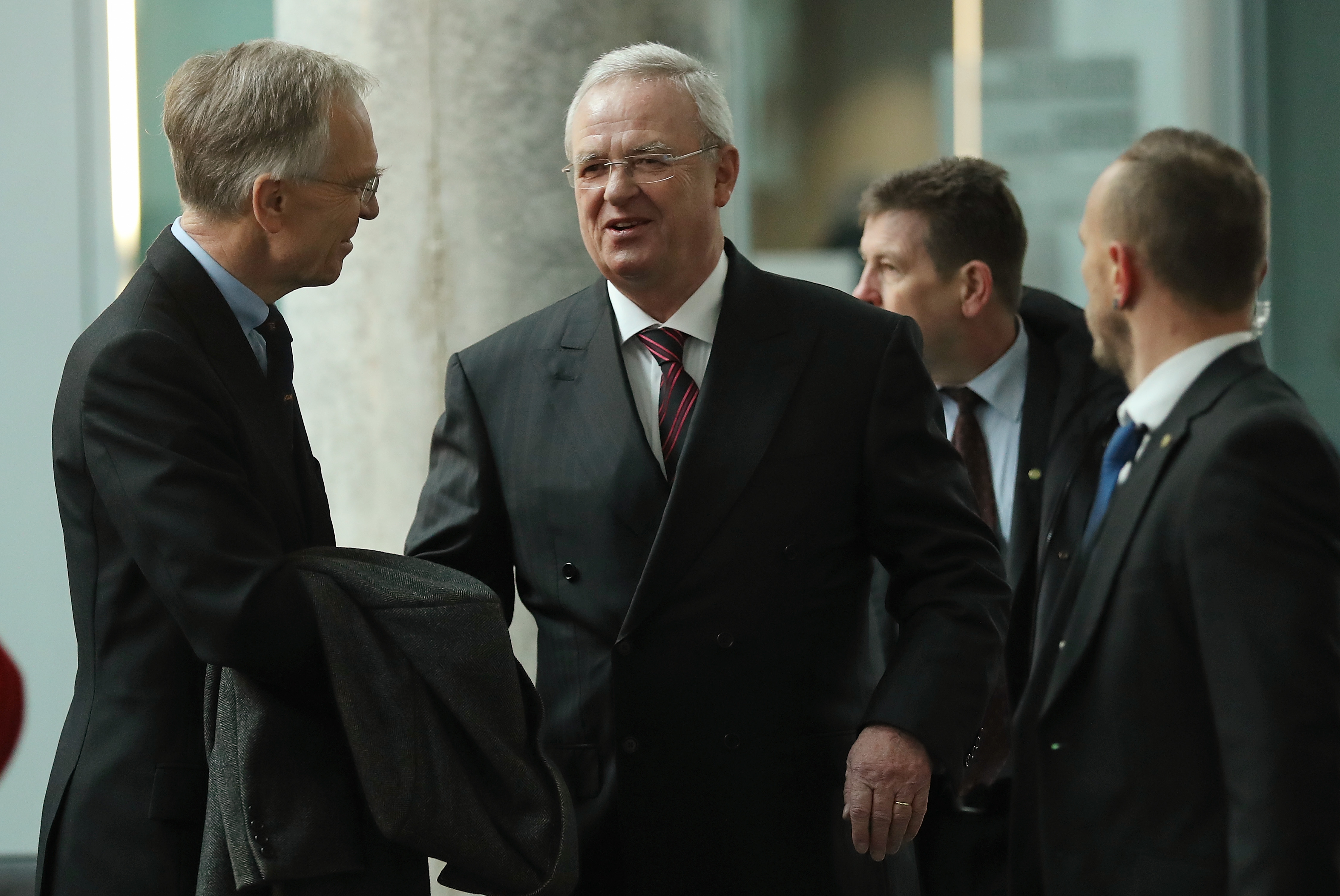 Martin Winterkorn (C), former CEO of German automaker Volkswagen AG, accompanied by his lawyer Kersten von Schenck (L), arrives to testify at the Bundestag commission investigating the Volkswagen diesel emissions scandal on January 19, 2017 in Berlin, Germany. (Credit: Sean Gallup/Getty Images)