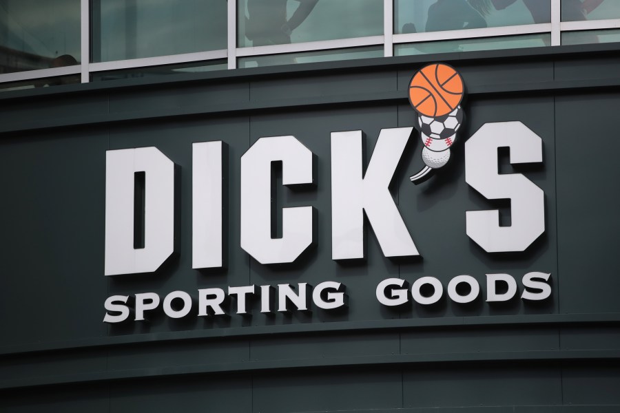 A sign hangs outside of a Dick's Sporting Goods store on February 28, 2018 in Chicago, Illinois. (Credit: Scott Olson/Getty Images)