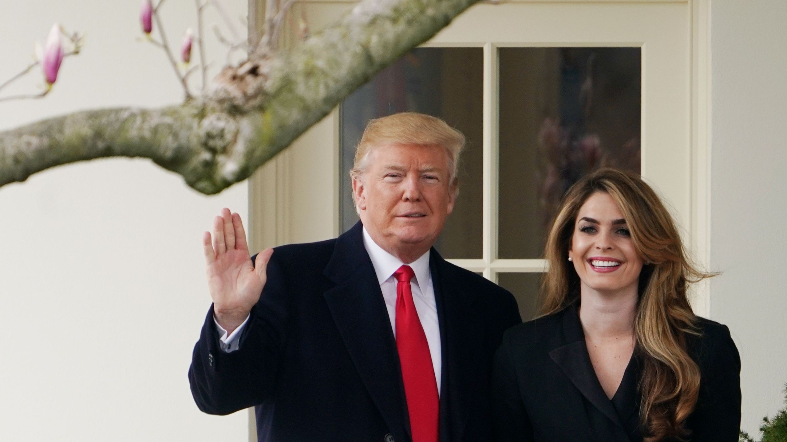 Donald Trump poses with Hope Hicks on the White House South Lawn on March 29, 2018. (Credit: Mandel Ngan/AFP/Getty Images)