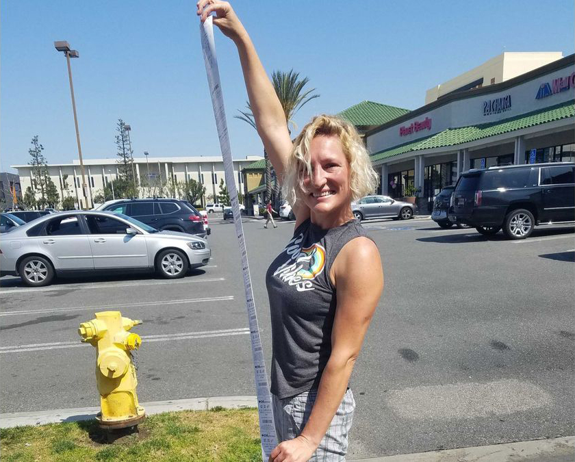 Nikki Boxer of Manhattan Beach holds a receipt from a CVS drugstore on March 25, 2019. (Credit: Diya Chacko / Los Angeles Times)