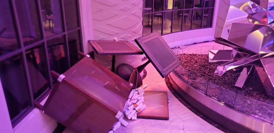 One moment passengers were sitting at a piano bar on their huge cruise ship and seconds later furniture went sliding until it ran into a wall. (Credit: Aaron Black)