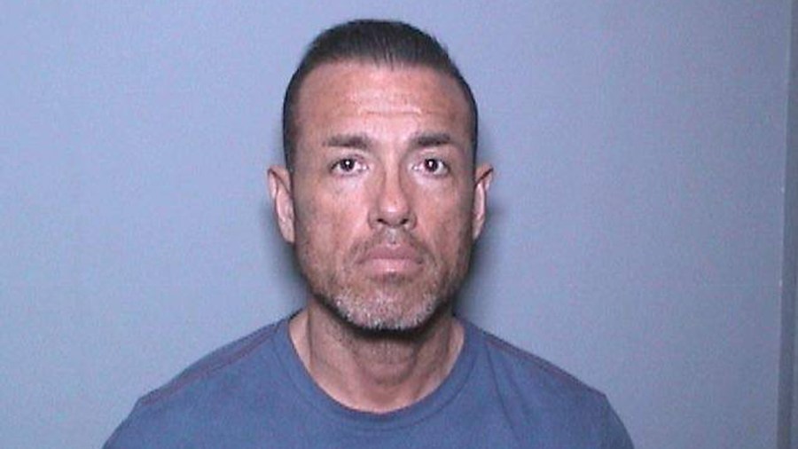 Carlos Juarez, 44, is seen in an undated booking photo provided by the Irvine Police Department.