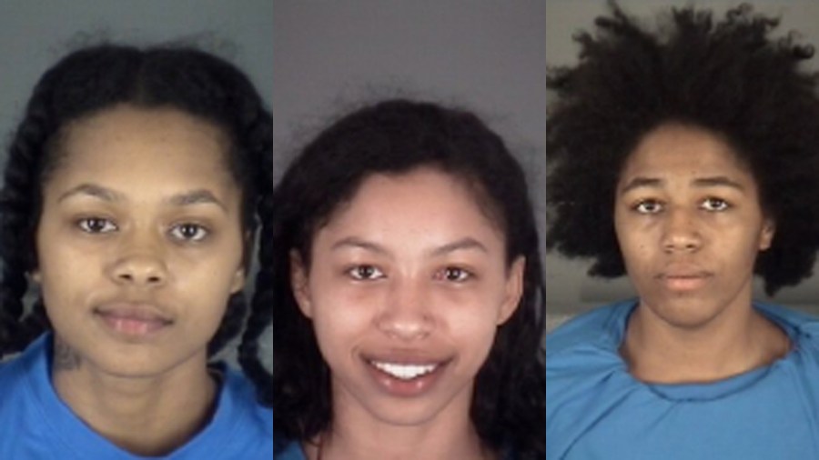 The booking photos of the three were women were obtained by WFTS and distributed by the CNN Wire.