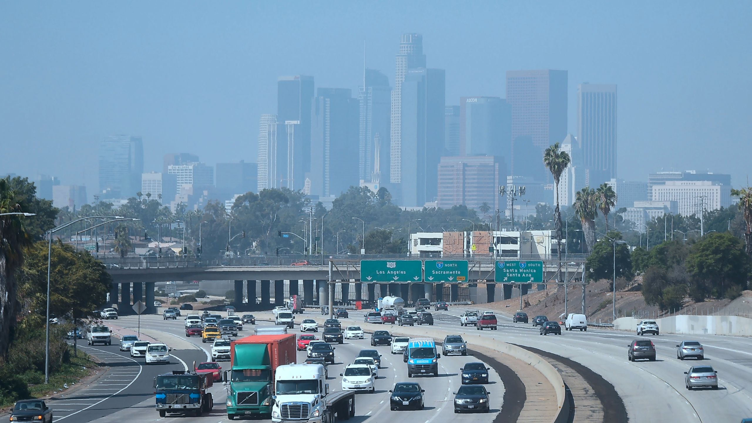 Highrise buildings in downtown Los Angeles are seen on on a hazy morning on Sept. 21, 2018. (Credit: FREDERIC J. BROWN/AFP/Getty Images)