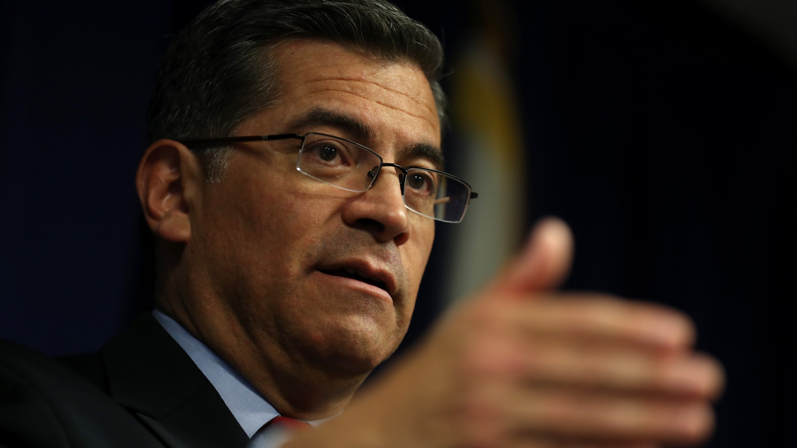 California Attorney General Xavier Becerra speaks to reporters during a press conference in Sacramento on March 5, 2019. (Credit: Justin Sullivan / Getty Images)