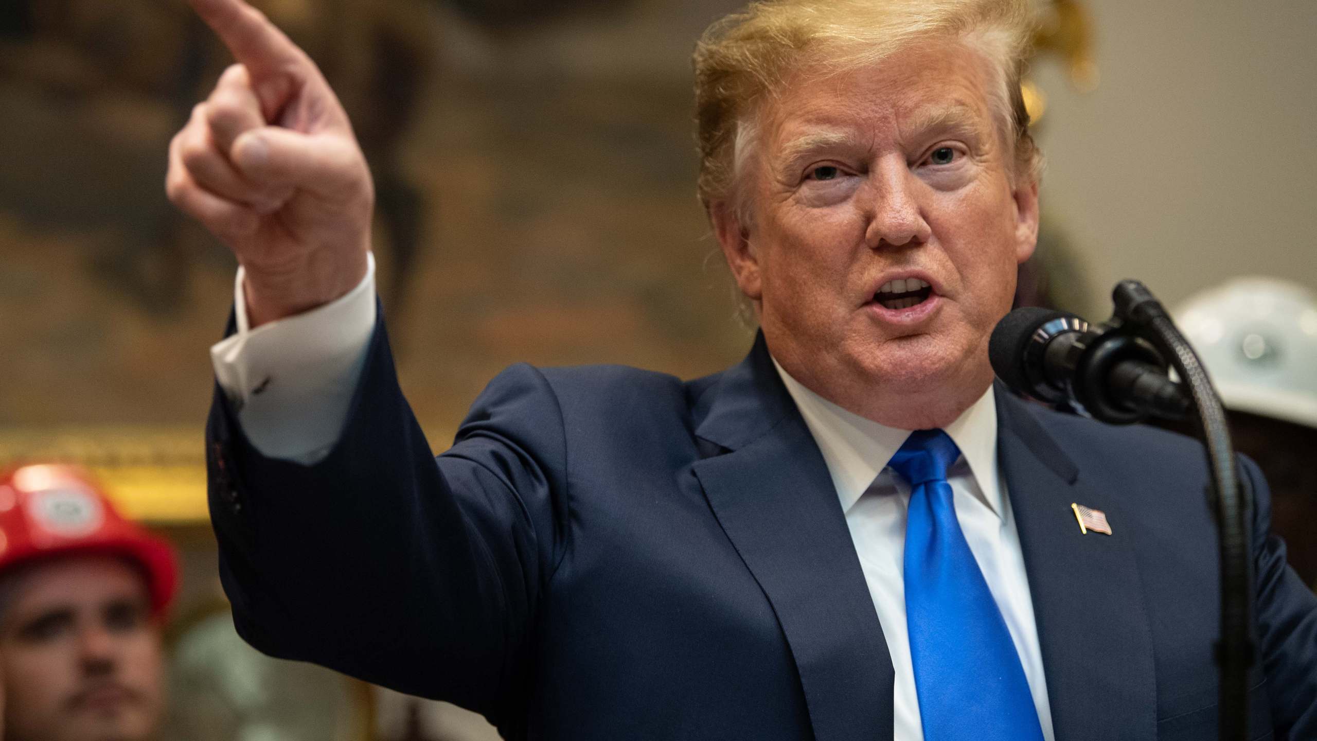 US President Donald Trump speaks during an announcement about 5G network deployment in the Roosevelt Room at the White House in Washington, DC, on April 12, 2019. (Credit: NICHOLAS KAMM/AFP/Getty Images)