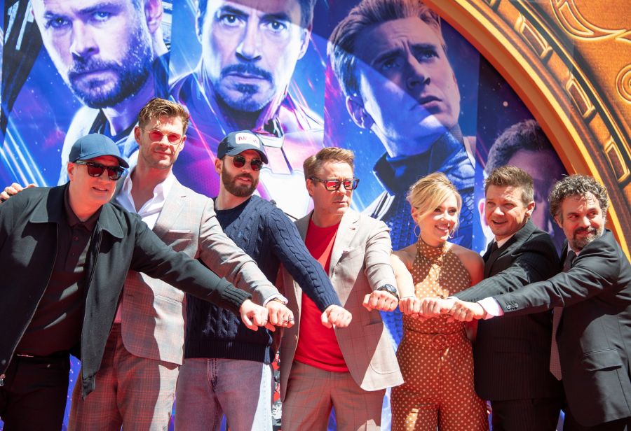 (From L-R) President of Marvel Studios/Producer Kevin Feige, actors Chris Hemsworth, Chris Evans, Robert Downey Jr., Scarlett Johansson, Mark Ruffalo and Jeremy Renner attends the Marvel Studios' 'Avengers: Endgame' cast place their hand prints in cement at TCL Chinese Theatre IMAX Forecourt on April 23, 2019, in Hollywood. (Credit: VALERIE MACON/AFP/Getty Images)