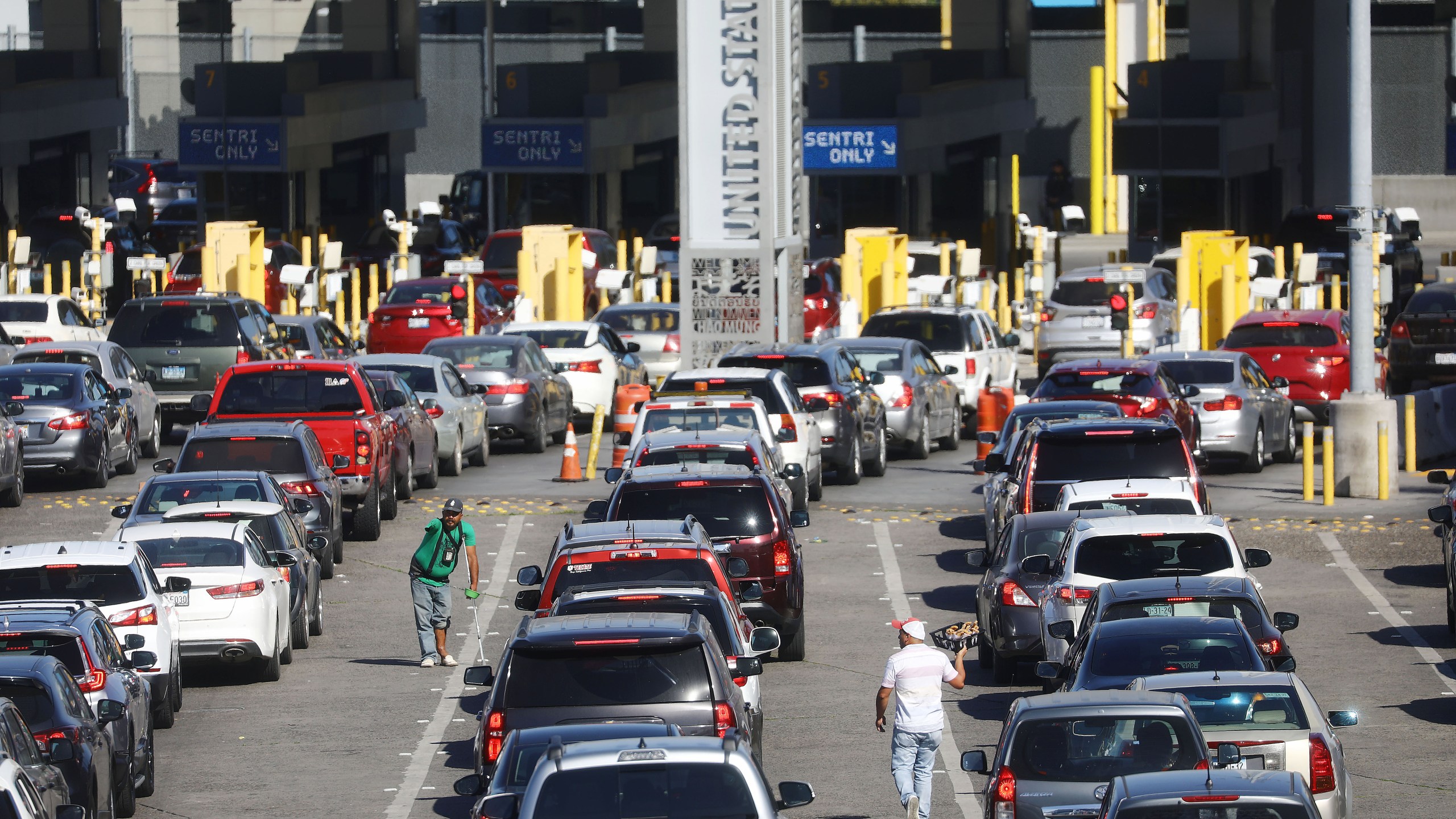 Cars line up to cross into the United States at the San Ysidro Port of Entry on March 31, 2019, in Tijuana, Mexico. (Credit: Mario Tama/Getty Images)