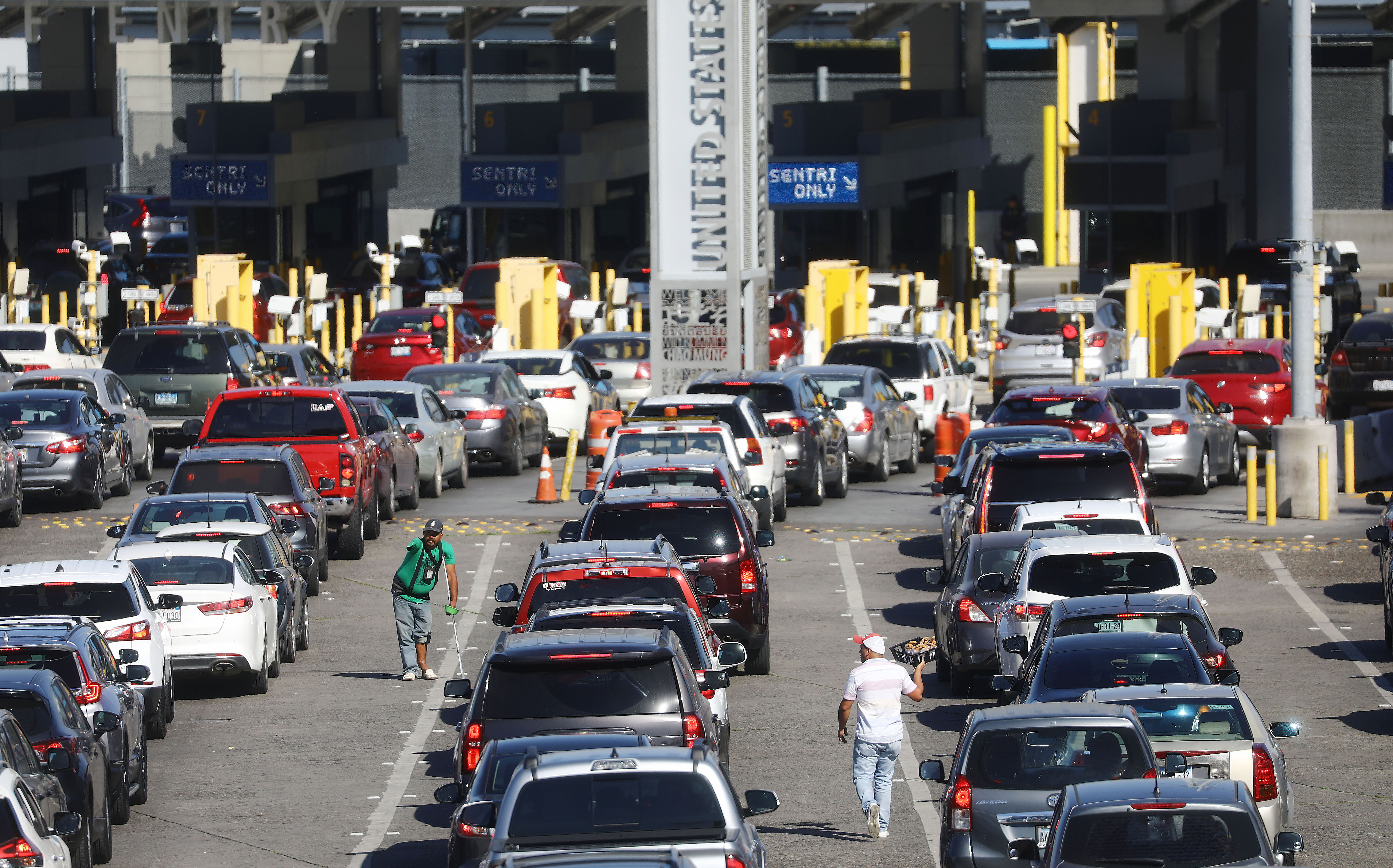 Cars line up to cross into the United States at the San Ysidro Port of Entry on March 31, 2019, in Tijuana, Mexico. (Credit: Mario Tama/Getty Images)