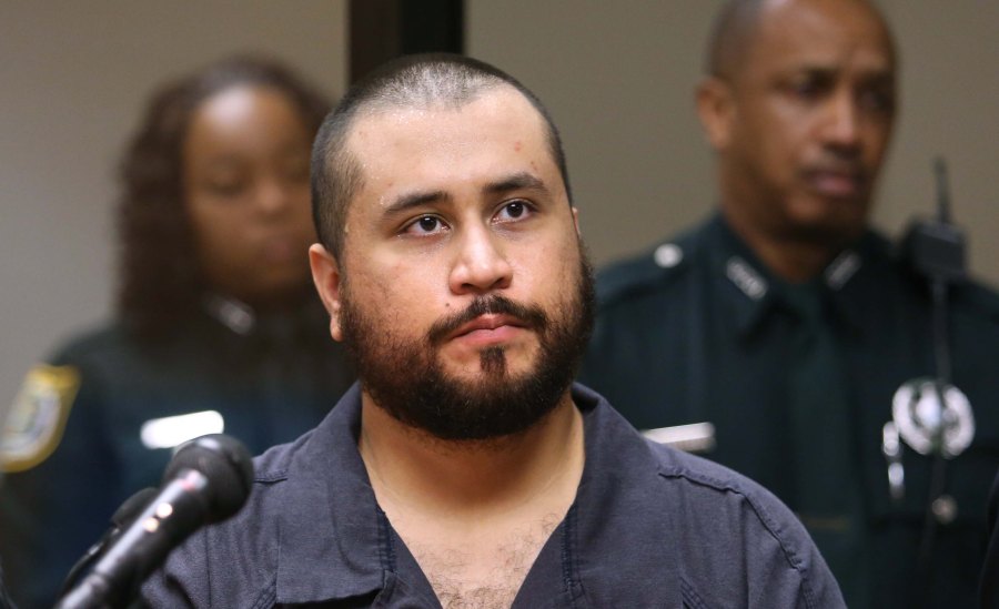 George Zimmerman, the acquitted shooter in the death of Trayvon Martin, faced a Seminole circuit judge during a first-appearance hearing on charges including aggravated assault stemming from a fight with his girlfriend November 19, 2013 in Sanford, Florida. (Credit: Joe Burbank-Pool/Getty Images)