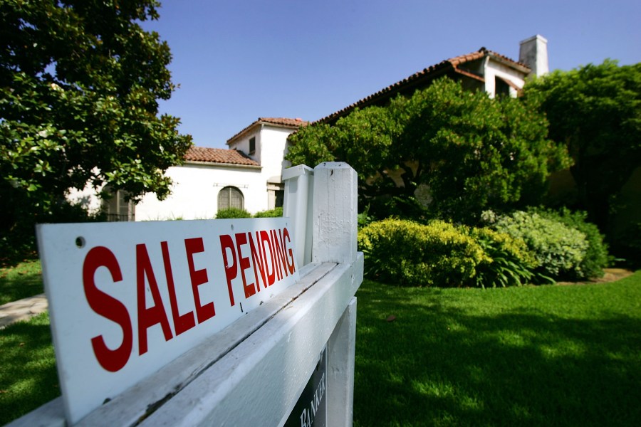 A Pasadena house is seen with a "For Sale" sign in a file photo. (David McNew/Getty Images)