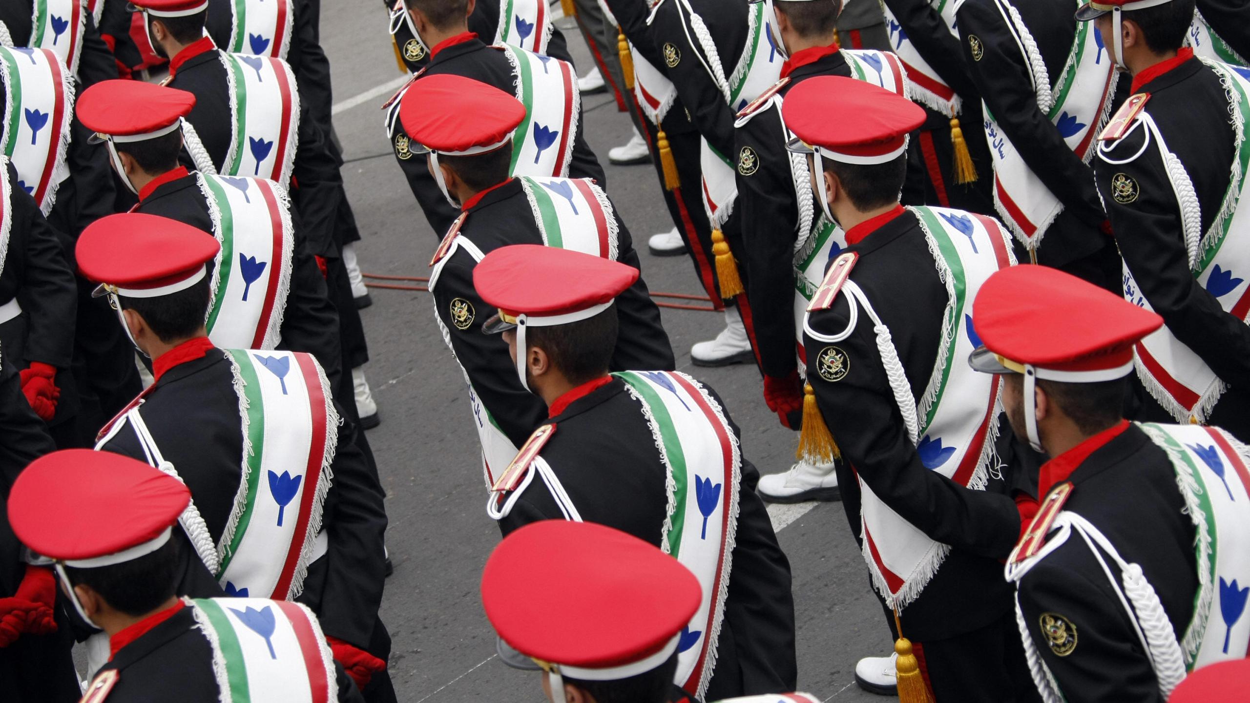 Iranian military policemen stand guard during a rally marking the 30th anniversary of the Islamic revolution in Tehran on February 10, 2009. (Credit: BEHROUZ MEHRI/AFP/Getty Images)