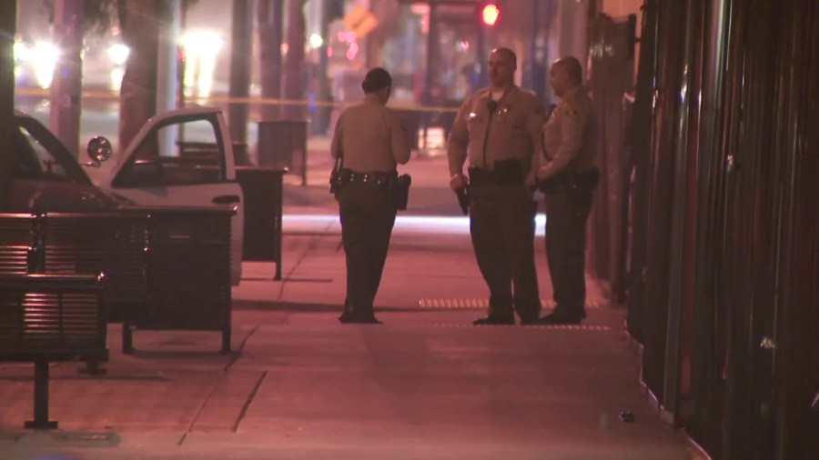 Los Angeles Sheriff's Department deputies work at the scene of a shooting in South Los Angeles on May 3, 2019.