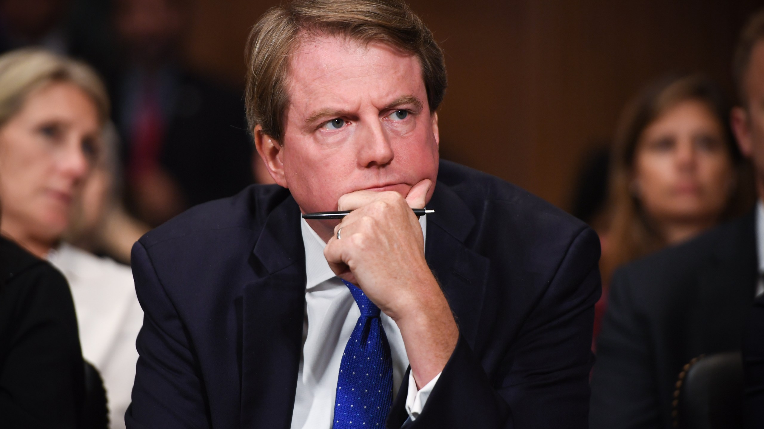 Donald McGahn listens as Supreme Court nominee Brett Kavanaugh testifies before the Senate Judiciary Committee on Capitol Hill on Sept. 27, 2018 in Washington, D.C. (Credit: Saul Loeb - Pool/Getty Images)