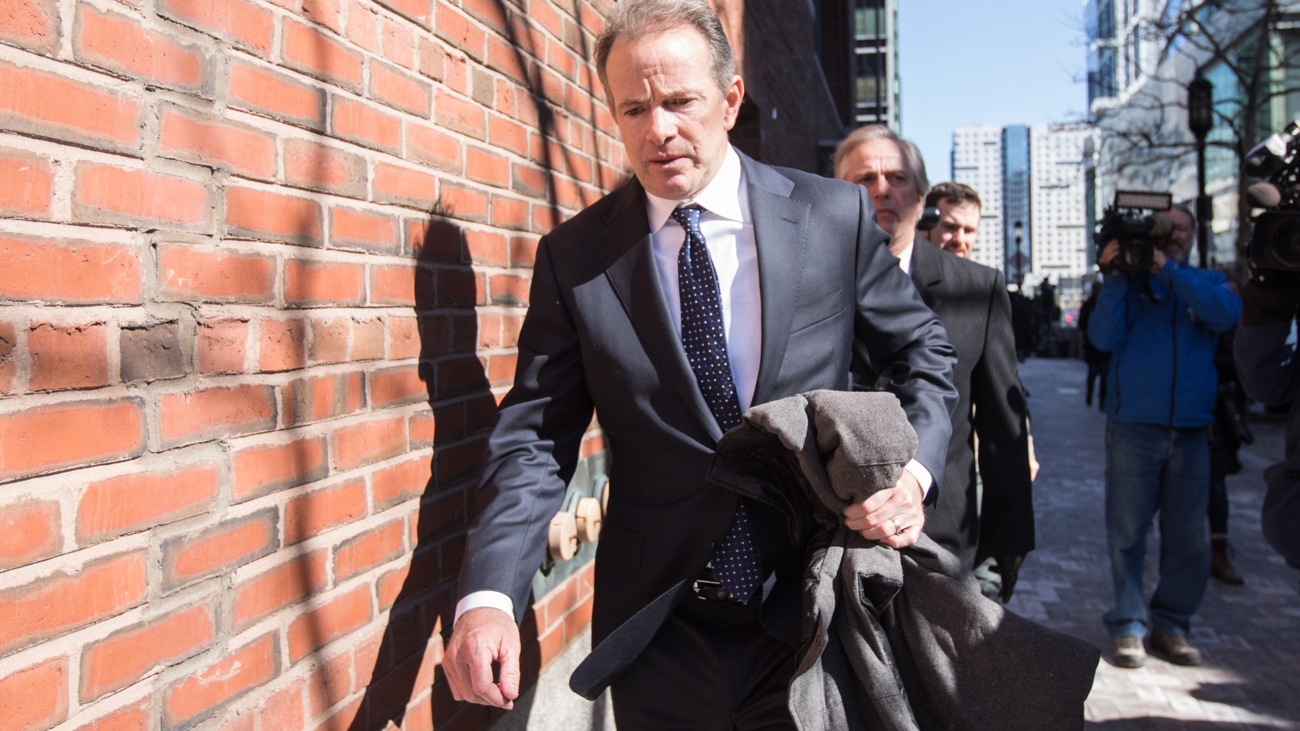 Gordon Ernst, former head coach of the men's and women's tennis teams at Georgetown University, leaves following his arraignment at Boston Federal Court on March 25, 2019 in Boston, Mass. (Credit: Scott Eisen/Getty Images)