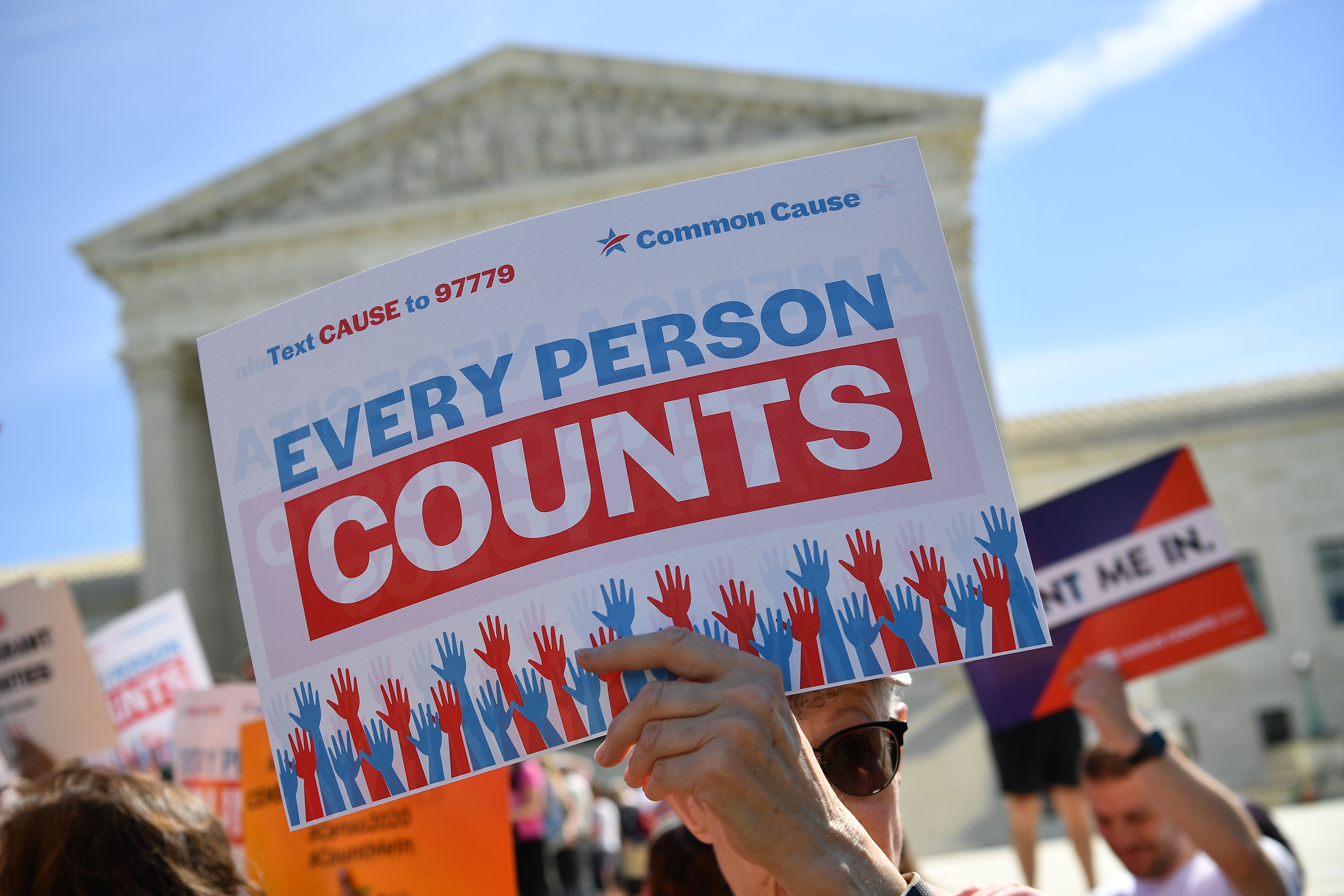 Demonstrators rally at the U.S. Supreme Court in Washington, D.C., on April 23, 2019, to protest a proposal to add a citizenship question in the 2020 census. (Credit: Mandel Ngan / AFP / Getty Images)