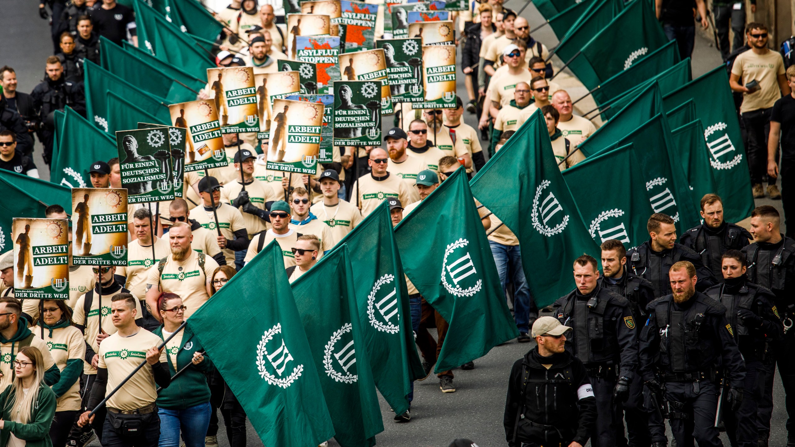 Supporters of the far-right The Third Way (Der Dritte Weg) movement march on May Day on May 1, 2019, in Plauen, Germany. (Credit: Carsten Koall/Getty Images)