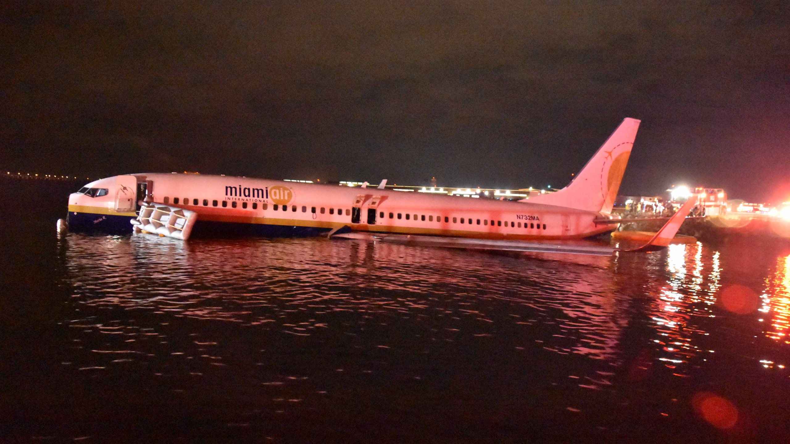 In this handout released by the U.S. Navy, a Boeing 737 aircraft carrying 136 passengers and seven crew from Naval Station Guantanamo Bay, Cuba, slid off the runway at Naval Air Station Jacksonville, Fla. into the St. Johns River, May 3, 2019. (Credit: U.S. Navy via Getty Images)