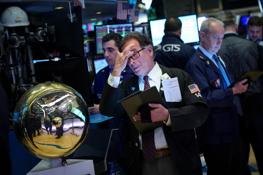 Traders and financial professionals work on the floor of the New York Stock Exchange (NYSE) ahead of the opening bell, May 8, 2019 in New York City. (Credit: Drew Angerer/Getty Images)