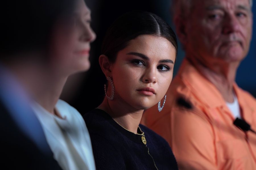 Singer and actress Selena Gomez, center, attends a press conference for the film "The Dead Don't Die" at the 72nd edition of the Cannes Film Festival in Cannes, France, on May 15, 2019. (Credit: LAURENT EMMANUEL/AFP/Getty Images)