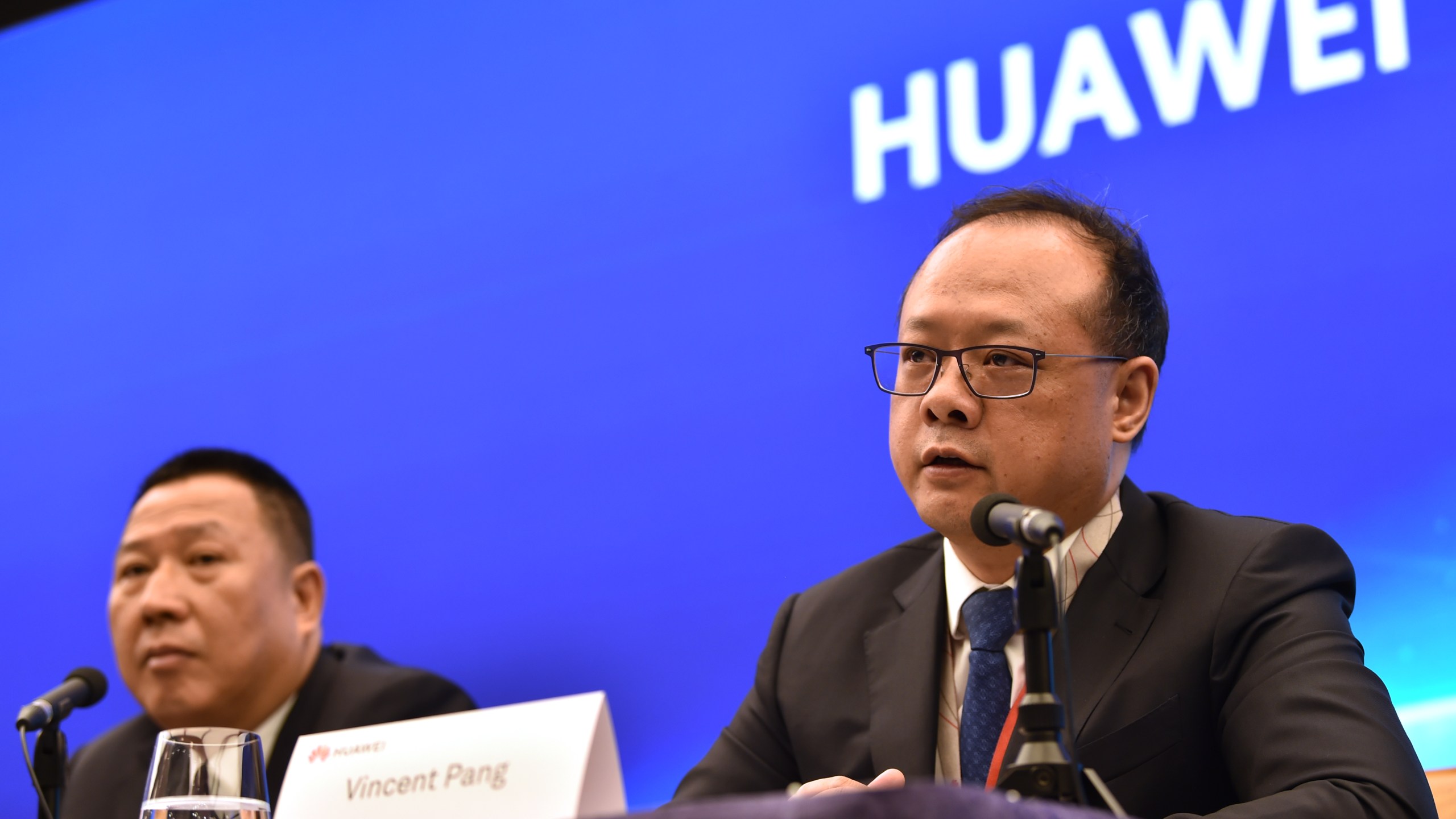 Song Liuping (L), chief legal officer of Chinese tech giant Huawei, and Vincent Pang (R), Head of Corporate Communications of Chinese tech giant Huawei, attend a press conference at the Huawei facilities in Shenzhen, Guangdong province on May 29, 2019. (Credit: HECTOR RETAMAL/AFP/Getty Images)