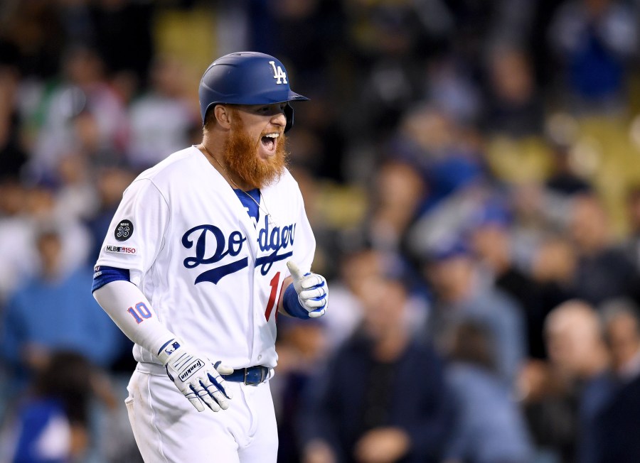 Justin Turner #10 of the Los Angeles Dodgers reacts to his two-run home run, to take a 9-4 lead over the Atlanta Braves, during the eighth inning at Dodger Stadium on May 8, 2019. (Credit: Harry How/Getty Images)